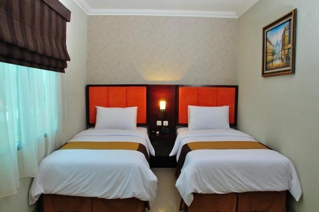 Feodora Airport Hotel Palembang Szoba fotó